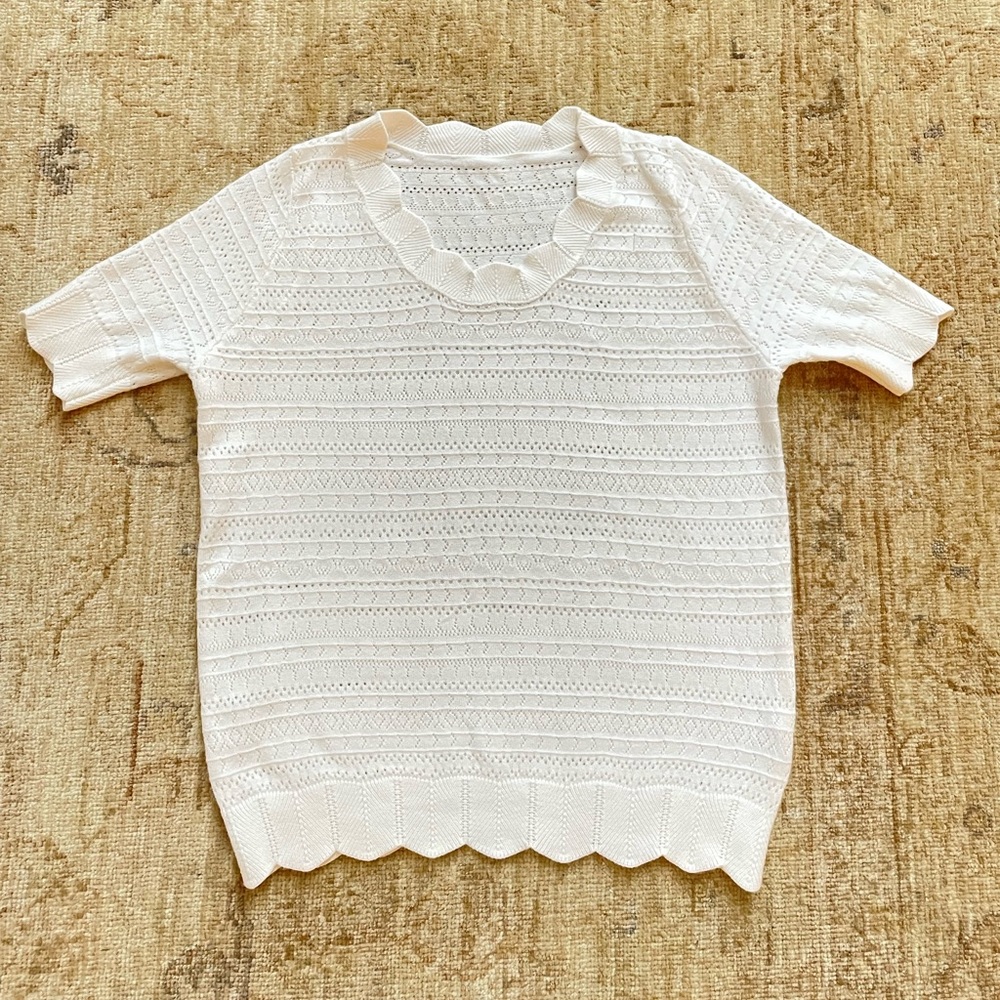 Pretty scalloped edged sweater size extra small.  White.